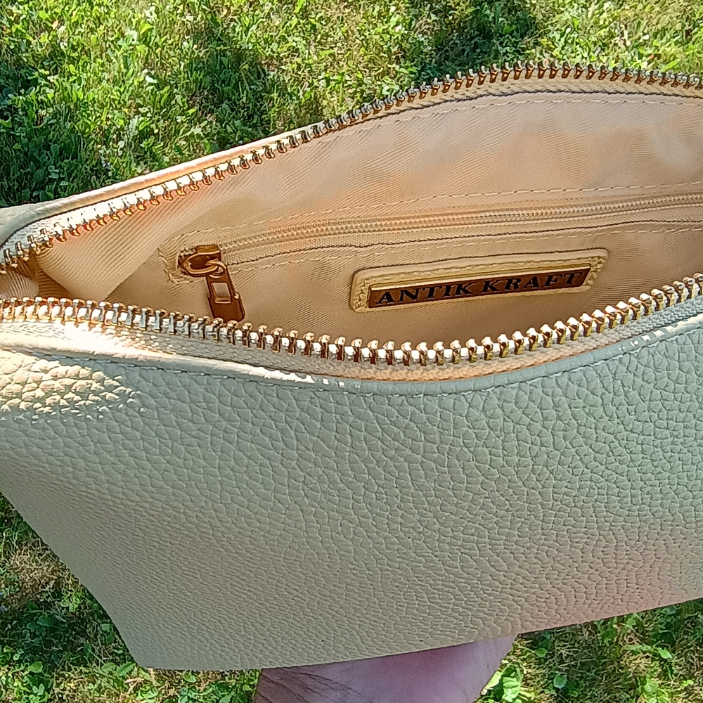 NWOT Butter soft, butter yellow vegan leather Annika Kraft make-up bag, preppy